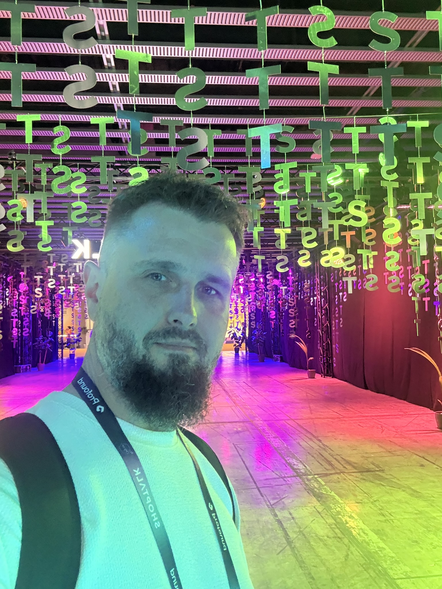 Marcin Grzegorczyk under the Shoptalk Europe 2026 light installation at Fira Gran Via, Barcelona
