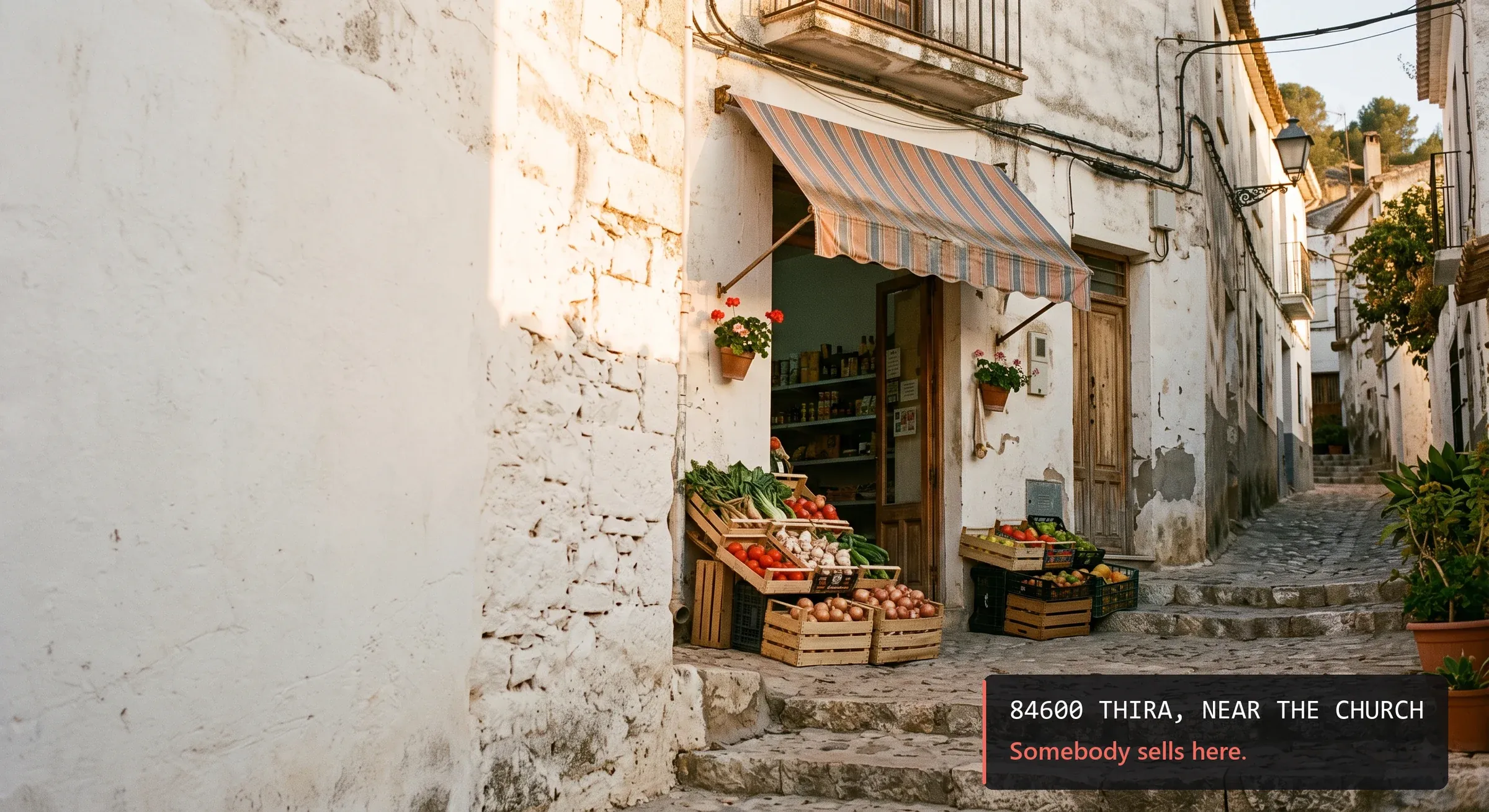 A small grocery shop in a narrow alley with no house number and no street sign